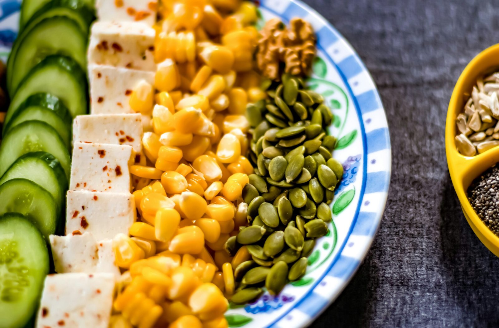 yellow corn on white and blue ceramic plate