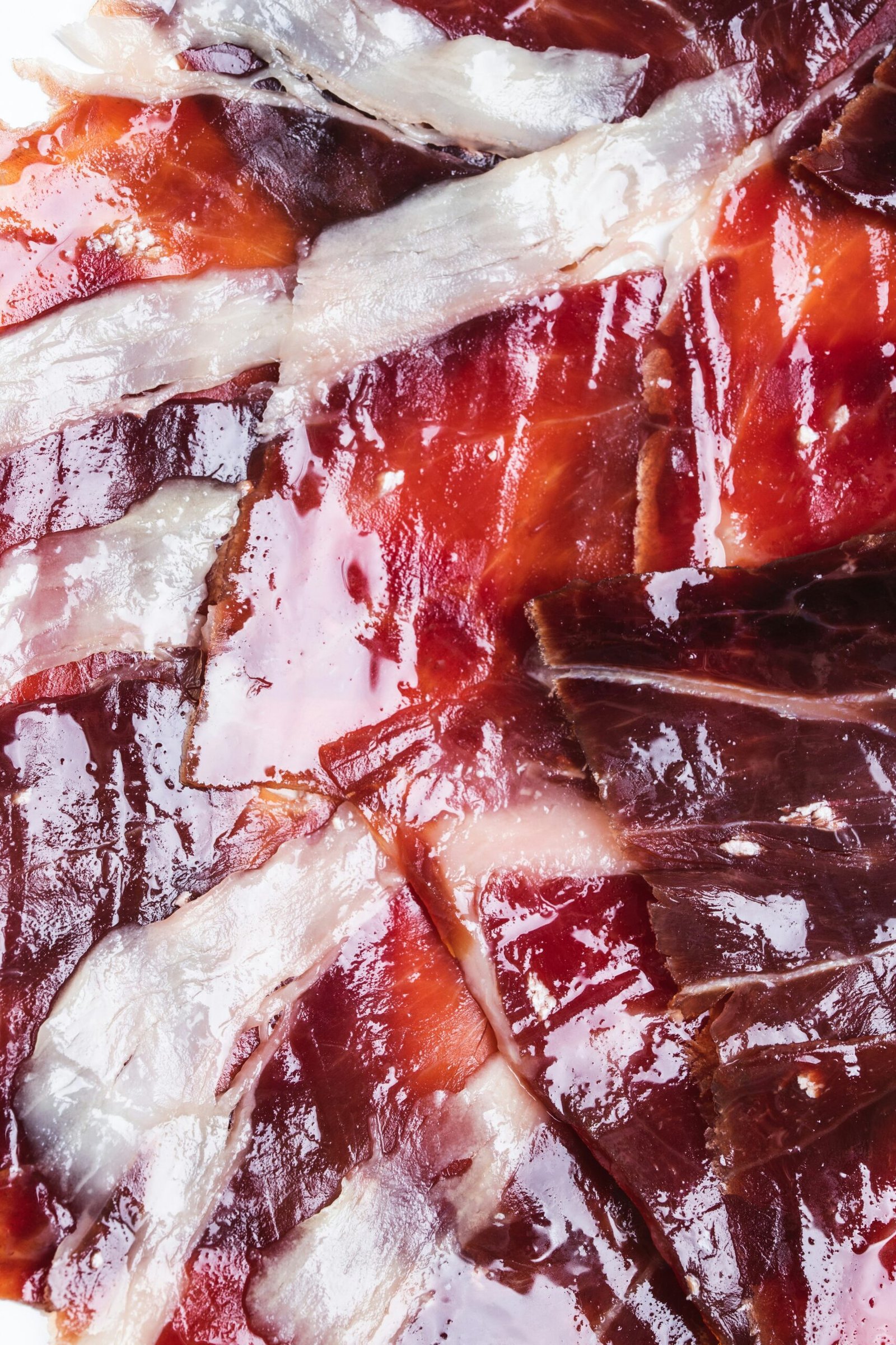 A close up of sliced meat on a plate